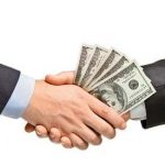 Hand shake with money